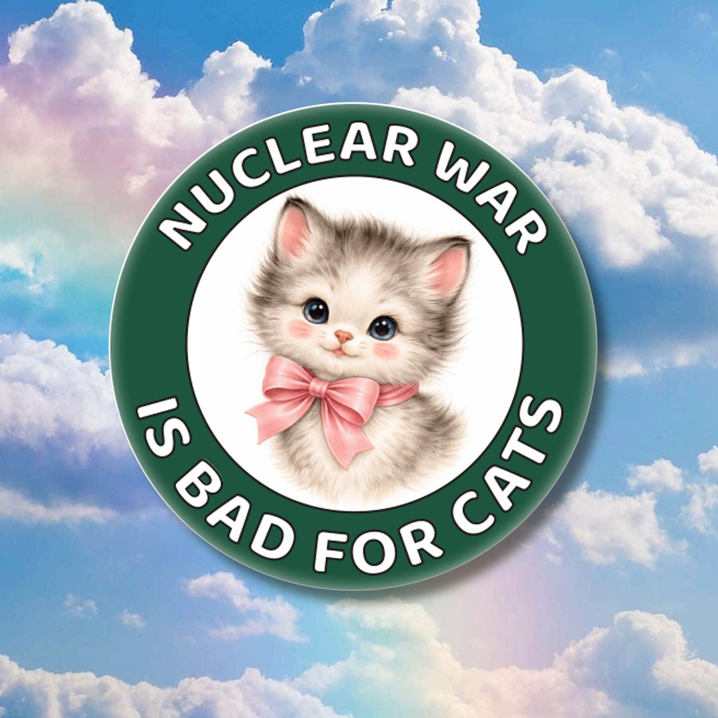 Button with a kitten and 'Nuclear War is Bad for Cats' text against a cloudy sky background